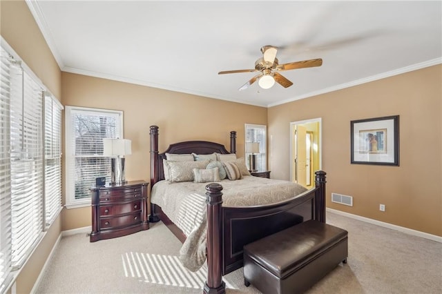 bedroom featuring ceiling fan, light carpet, crown molding, and multiple windows