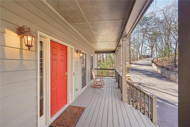 wooden deck featuring covered porch