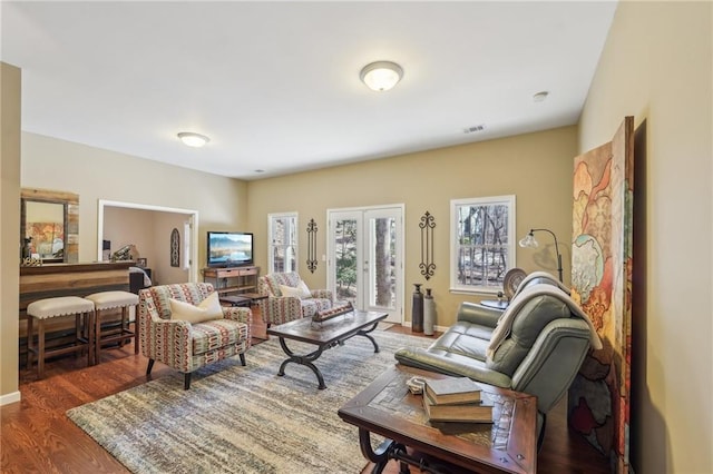 living room featuring dark hardwood / wood-style floors