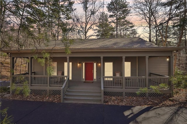 view of front of home featuring covered porch