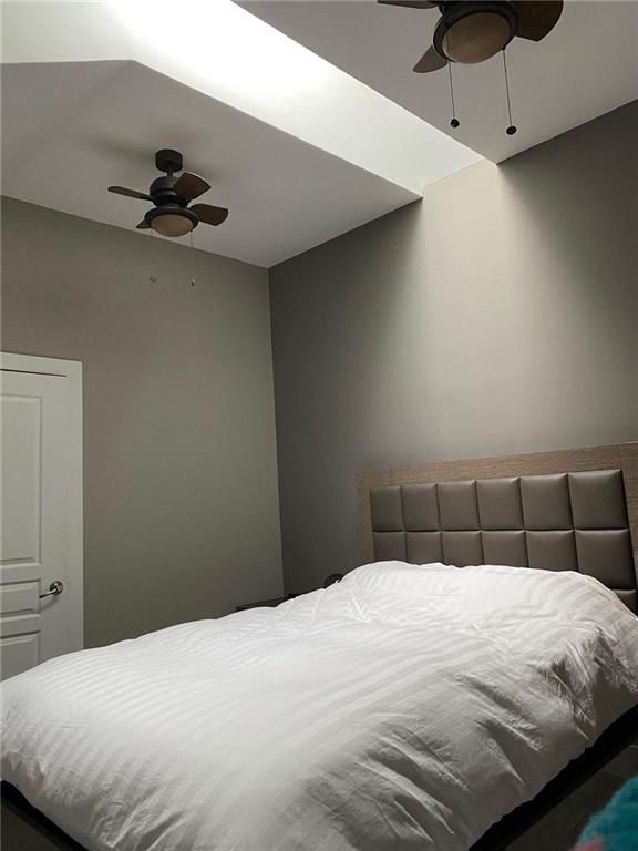799 Hammond Dr Unit 406, Atlanta, GA 30328 - bedroom with a ceiling fan