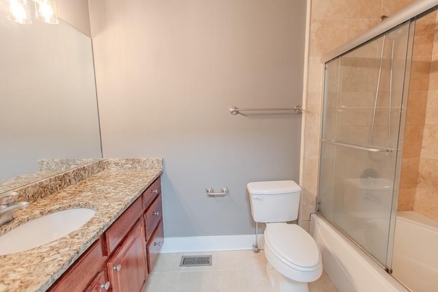 799 Hammond Dr Unit 406, Atlanta, GA 30328 - bathroom featuring vanity, visible vents, baseboards, tile patterned floors, and toilet