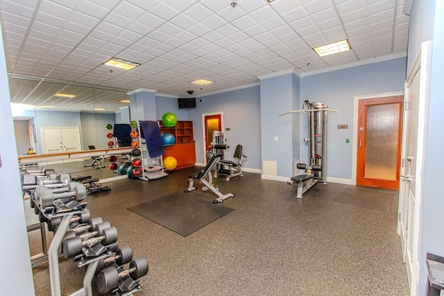 799 Hammond Dr Unit 406, Atlanta, GA 30328 - gym featuring a drop ceiling, baseboards, and ornamental molding