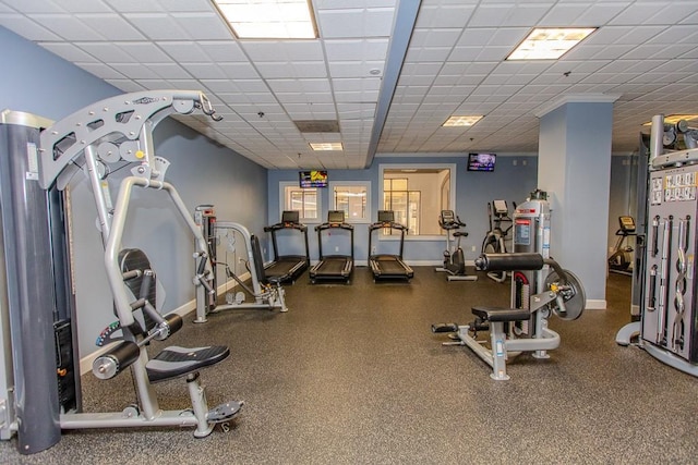 799 Hammond Dr Unit 406, Atlanta, GA 30328 - gym featuring baseboards and a drop ceiling