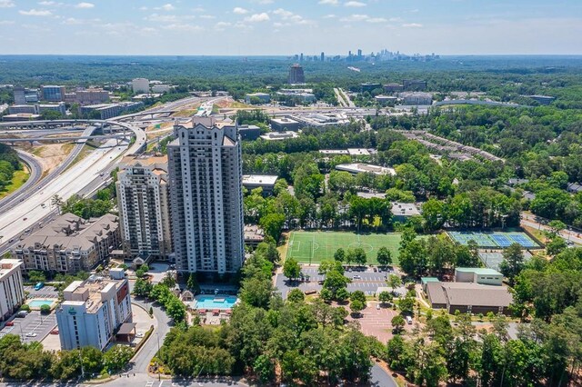 799 Hammond Dr Unit 406, Atlanta, GA 30328 - drone / aerial view with a city view