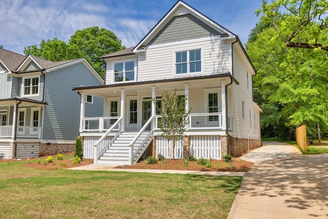 231 E Marable St, Monroe, GA 30655 - view of front of property featuring a porch, stairway, driveway, and a front lawn