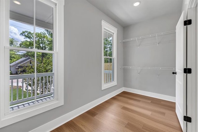 231 E Marable St, Monroe, GA 30655 - spacious closet featuring wood finished floors