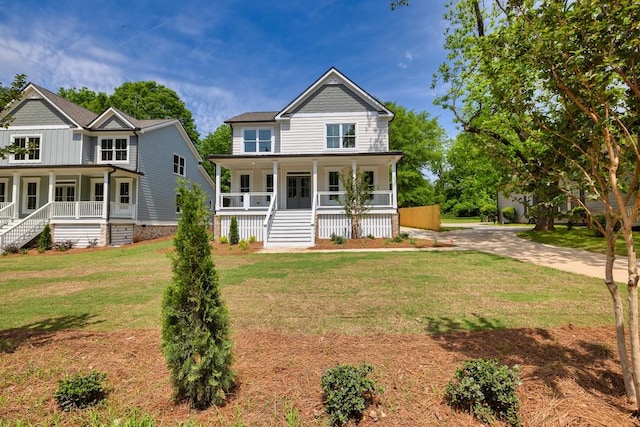 231 E Marable St, Monroe, GA 30655 - view of front of home with covered porch, stairs, and a front yard