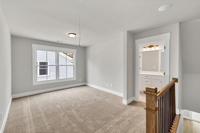 231 E Marable St, Monroe, GA 30655 - carpeted spare room featuring baseboards