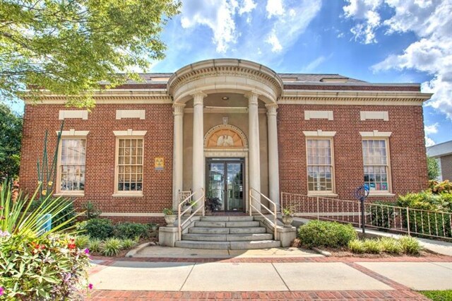 231 E Marable St, Monroe, GA 30655 - entrance to property with french doors and brick siding