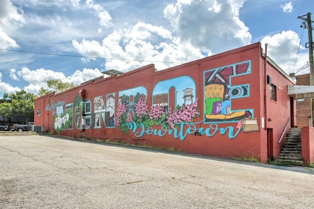 231 E Marable St, Monroe, GA 30655 - view of property featuring central air condition unit