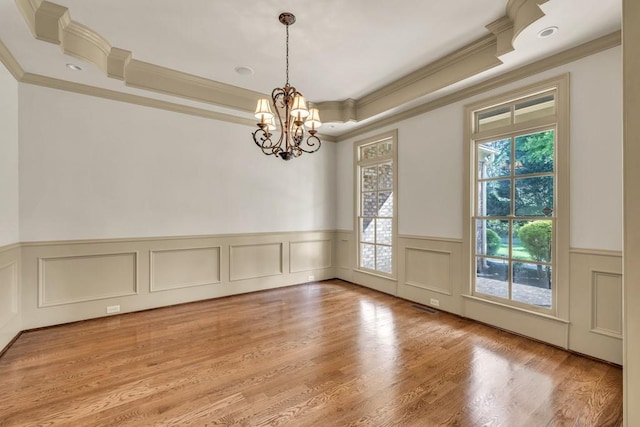 9145 Greenway Ct, Gainesville, GA 30506 - unfurnished room with ornamental molding, a chandelier, a wainscoted wall, a decorative wall, and a raised ceiling