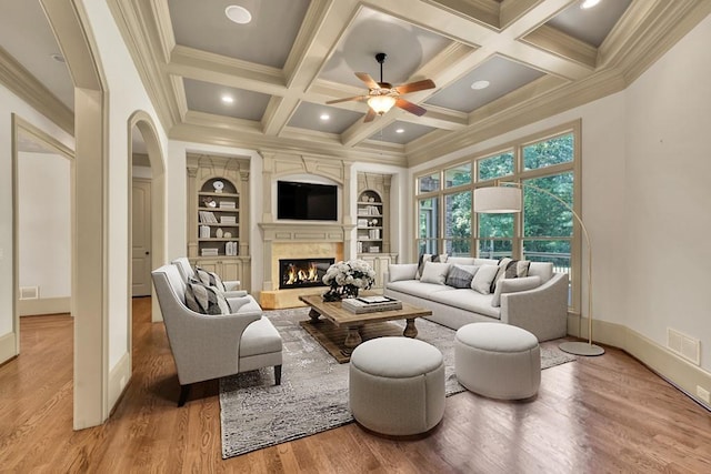 9145 Greenway Ct, Gainesville, GA 30506 - living area featuring ornamental molding, a ceiling fan, light wood finished floors, coffered ceiling, and baseboards
