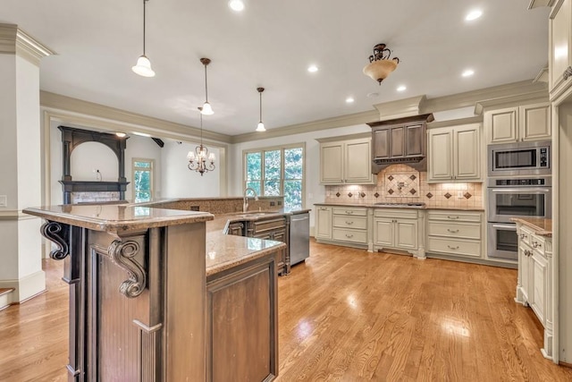 9145 Greenway Ct, Gainesville, GA 30506 - kitchen featuring appliances with stainless steel finishes, cream cabinetry, backsplash, light wood-type flooring, and recessed lighting