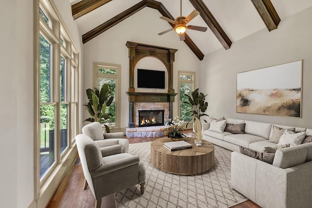 9145 Greenway Ct, Gainesville, GA 30506 - living area with plenty of natural light, beamed ceiling, ceiling fan, light wood-style floors, and high vaulted ceiling