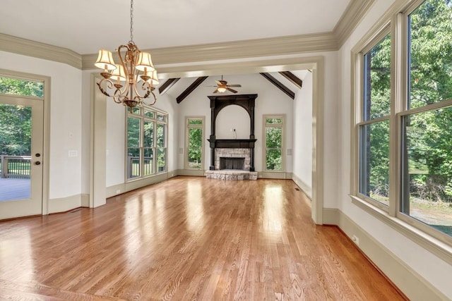 9145 Greenway Ct, Gainesville, GA 30506 - unfurnished living room featuring a stone fireplace, light wood-style floors, a chandelier, and plenty of natural light