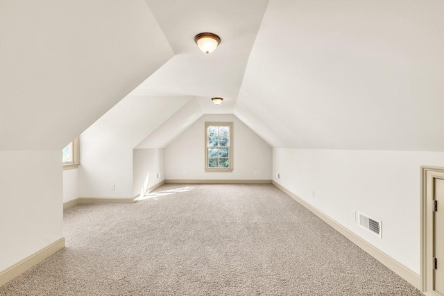 9145 Greenway Ct, Gainesville, GA 30506 - bonus room featuring carpet, lofted ceiling, and baseboards