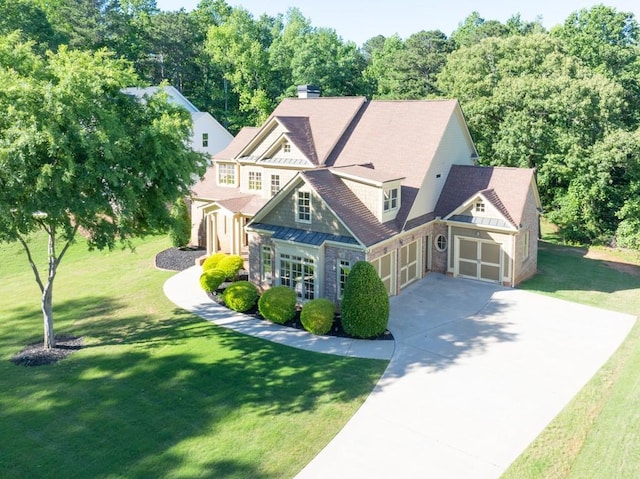 9145 Greenway Ct, Gainesville, GA 30506 - view of front facade featuring driveway, a front yard, and an attached garage