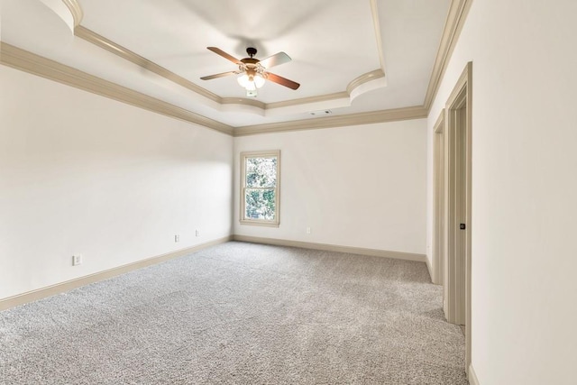 9145 Greenway Ct, Gainesville, GA 30506 - empty room with crown molding, a raised ceiling, carpet flooring, ceiling fan, and baseboards