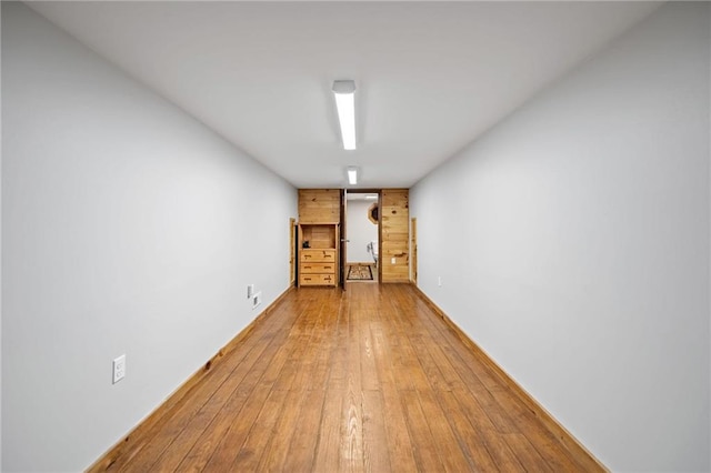 empty room featuring wood finished floors