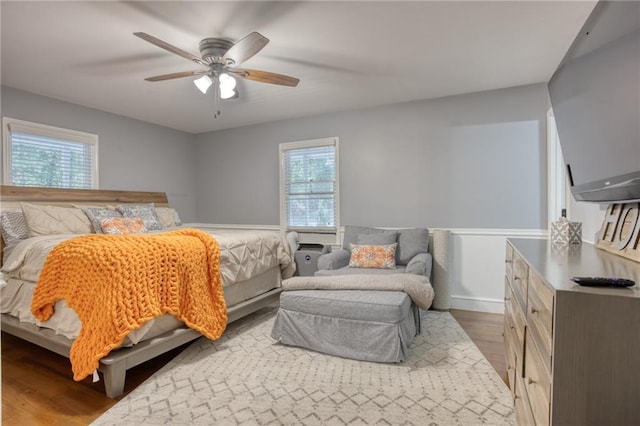 bedroom featuring ceiling fan and light hardwood / wood-style floors