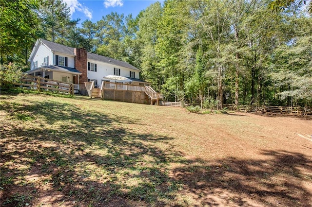 view of yard with a deck