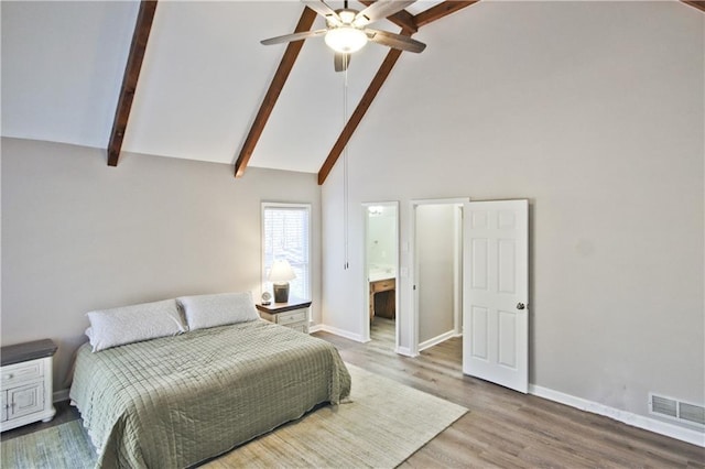 bedroom with beam ceiling, visible vents, high vaulted ceiling, and wood finished floors