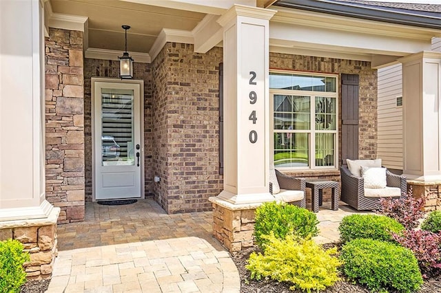 2940 W Village Dr Unit 60, Suwanee, GA 30024 - entrance to property featuring covered porch and stone siding