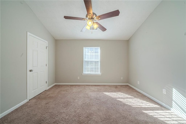 empty room with light carpet and ceiling fan