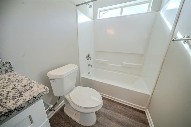 full bathroom featuring vanity,  shower combination, and toilet