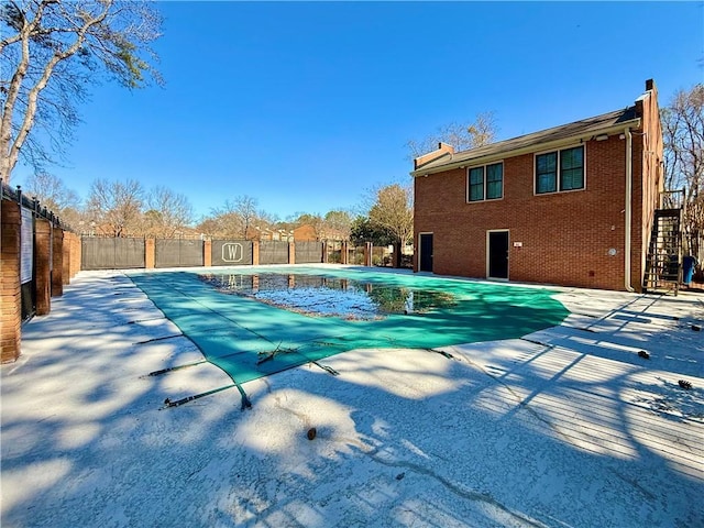 view of pool with a patio, a fenced backyard, and a fenced in pool