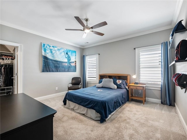 bedroom featuring multiple windows, crown molding, light colored carpet, and ceiling fan