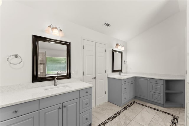 185 Lee Path, Acworth, GA 30102 - bathroom featuring two vanities and marble finish flooring