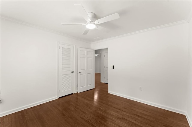185 Lee Path, Acworth, GA 30102 - unfurnished bedroom featuring dark wood finished floors, crown molding, a closet, and a ceiling fan