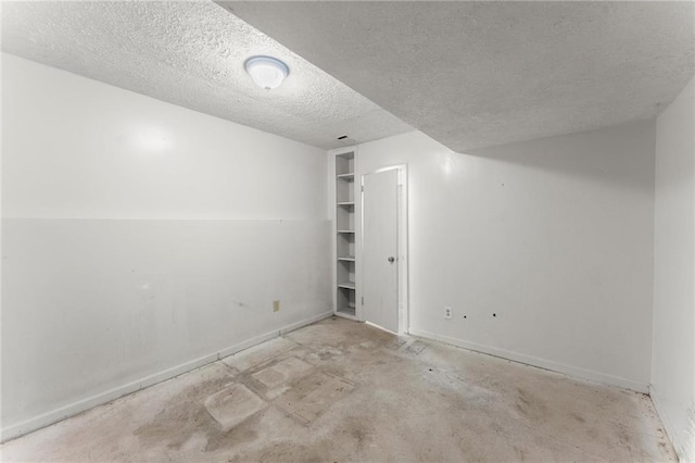 185 Lee Path, Acworth, GA 30102 - unfurnished room featuring a textured ceiling and unfinished concrete floors