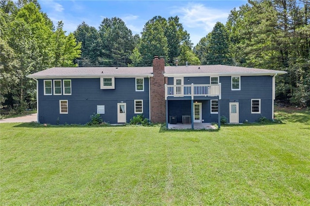 185 Lee Path, Acworth, GA 30102 - rear view of house with a patio area, a yard, a chimney, and a wooden deck
