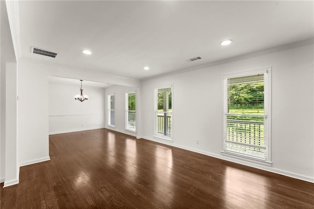 185 Lee Path, Acworth, GA 30102 - unfurnished living room featuring a chandelier, plenty of natural light, dark wood-style floors, crown molding, and recessed lighting