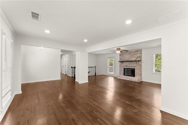 185 Lee Path, Acworth, GA 30102 - unfurnished living room with ornamental molding, wood finished floors, a large fireplace, recessed lighting, and a ceiling fan