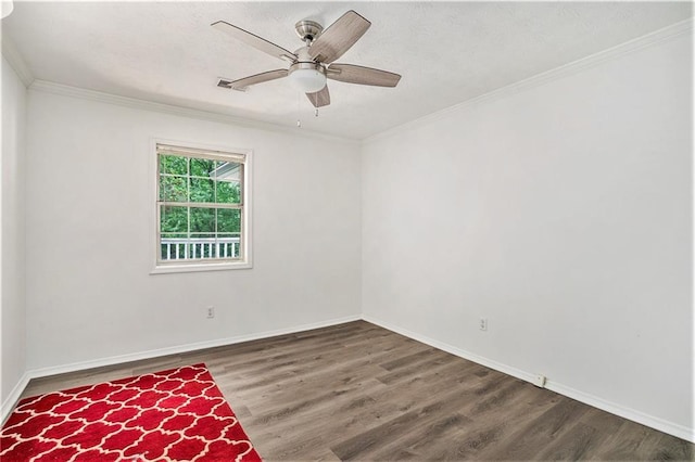 unfurnished room with wood finished floors, crown molding, visible vents, baseboards, and ceiling fan