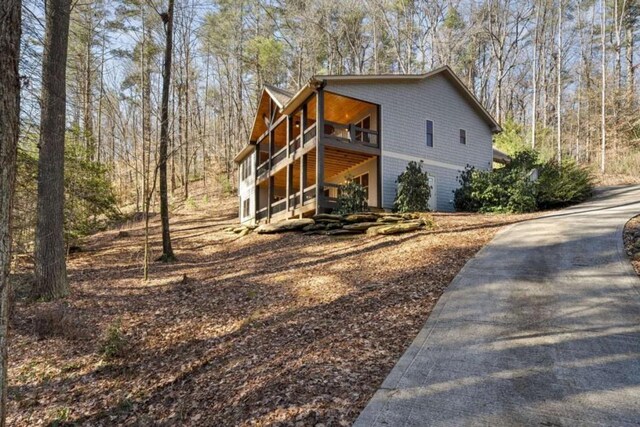 view of side of home featuring brick siding