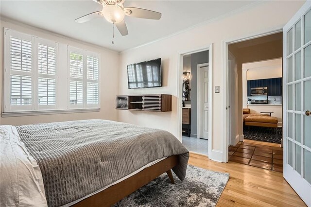 1078 Piedmont Ave NE Unit 206, Atlanta, GA 30309 - kitchen with stainless steel appliances, dark cabinets, plenty of natural light, and open shelves