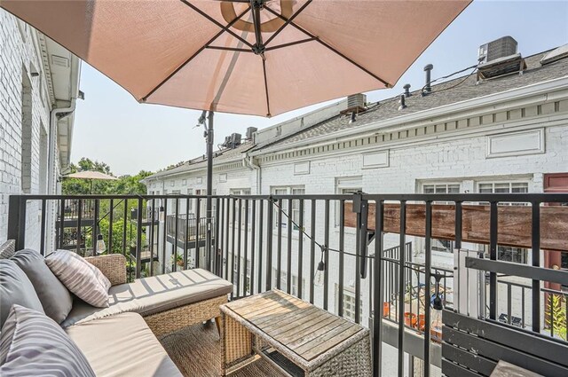 1078 Piedmont Ave NE Unit 206, Atlanta, GA 30309 - bedroom featuring wood finished floors and baseboards