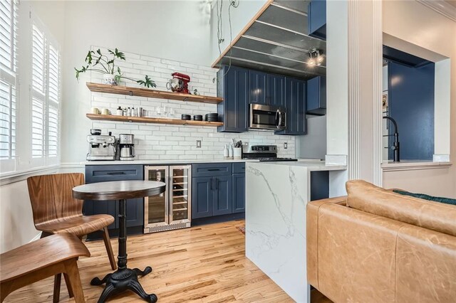 1078 Piedmont Ave NE Unit 206, Atlanta, GA 30309 - unfurnished bedroom with ornamental molding and light wood-type flooring