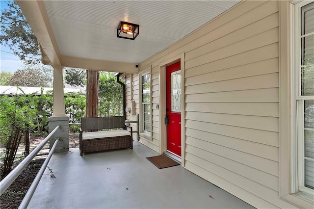 doorway to property featuring a porch