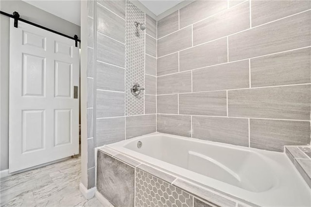 bathroom featuring tiled shower / bath combo