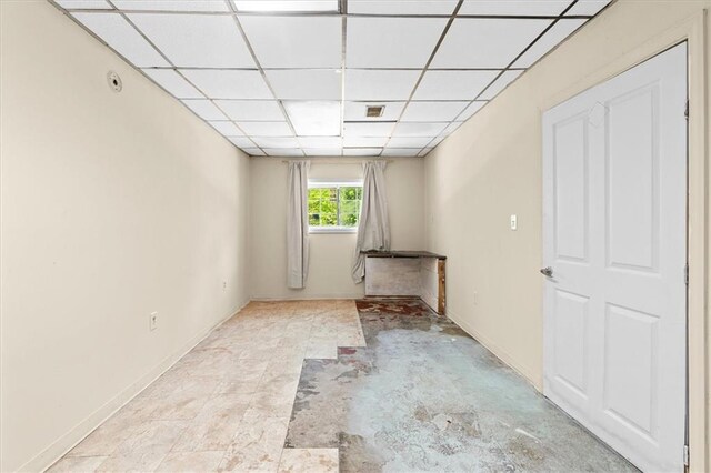843 Mcafee St, Dalton, GA 30721 - unfurnished room featuring baseboards and a drop ceiling