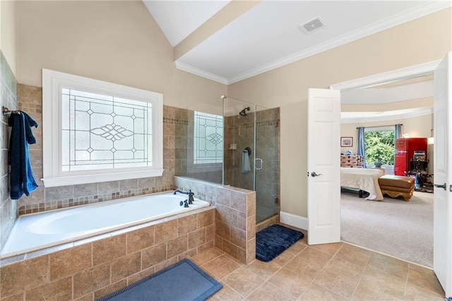 full bath featuring ensuite bathroom, a stall shower, a garden tub, crown molding, and tile patterned floors