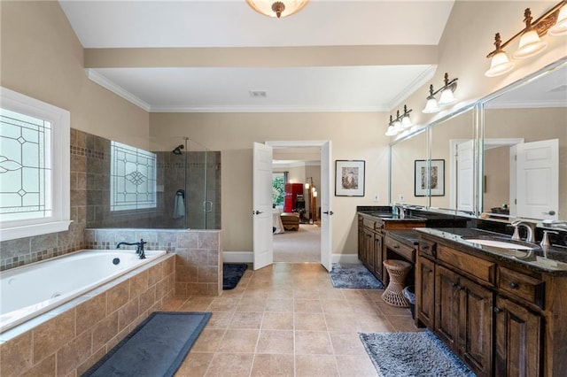 full bathroom featuring plenty of natural light, a tile shower, a bath, tile patterned flooring, and crown molding