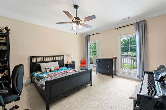 bedroom featuring access to outside, carpet flooring, ornamental molding, a ceiling fan, and an office area