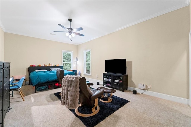 living area with carpet, baseboards, ornamental molding, and a ceiling fan